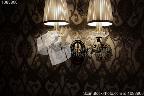 Image of Photo of wall lamp with dim light   