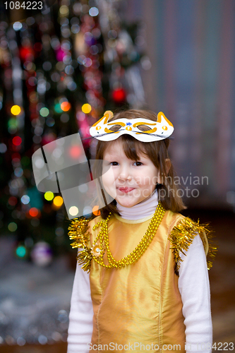 Image of Girl wearing carnival mask