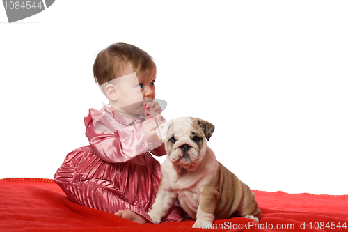 Image of Baby and puppy