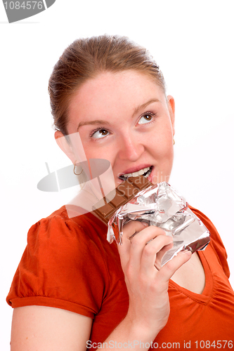 Image of Woman eating chocolate