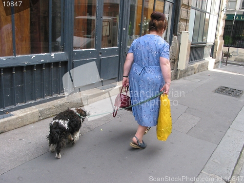 Image of Woman with dog Paris, France.