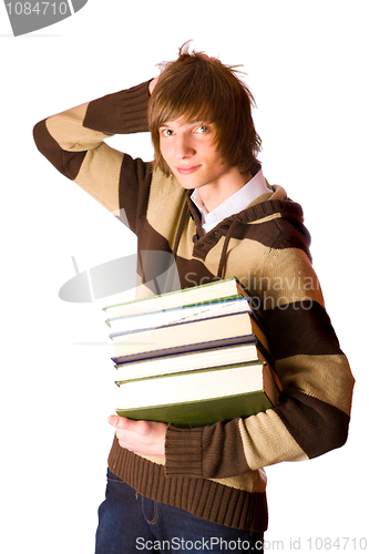 Image of Young man holding books