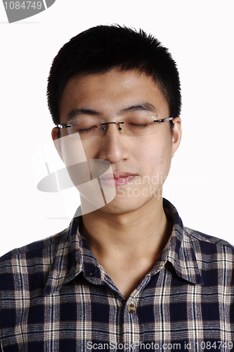 Image of man with eyes closed 