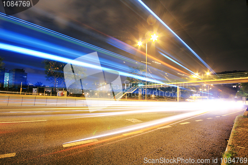 Image of Megacity Highway at night with light trails