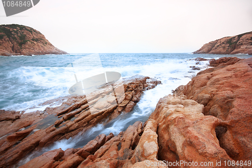 Image of Beautiful seascape. Sea and rock at the sunset. Nature compositi