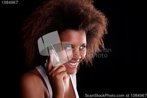 Image of Beautiful black woman happy on the phone