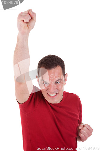Image of Portrait of a happy  man with his arm raised