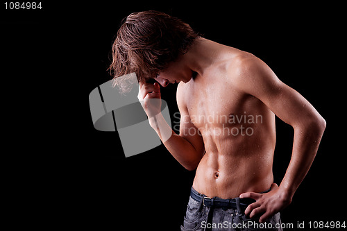 Image of a tired and sweat  young man in topless