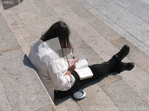 Image of Girl reading a book.