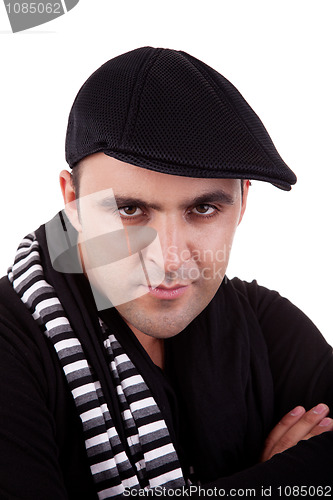 Image of Portrait of a young man serious, in autumn/winter clothes