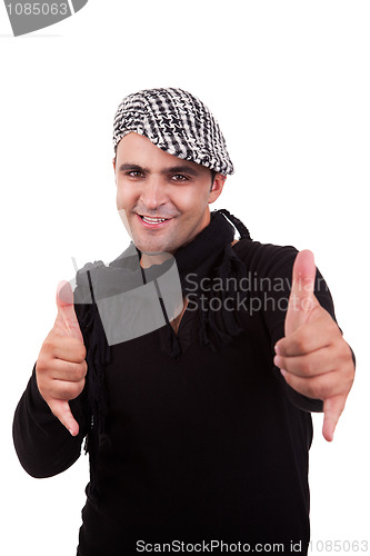 Image of handsome man with his hands rise up as a sign of everything cool