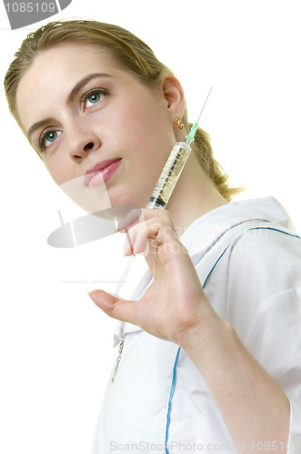 Image of Young woman paramedic with syringe