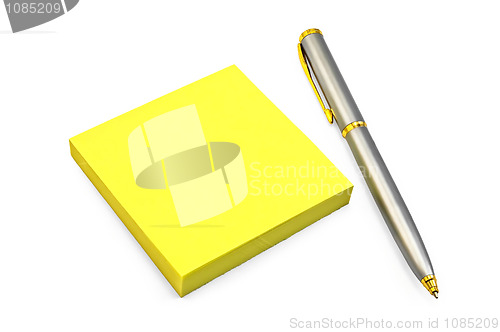 Image of Yellow paper with a silver pen