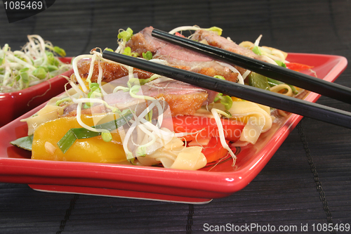 Image of Duck breast with fried noodles