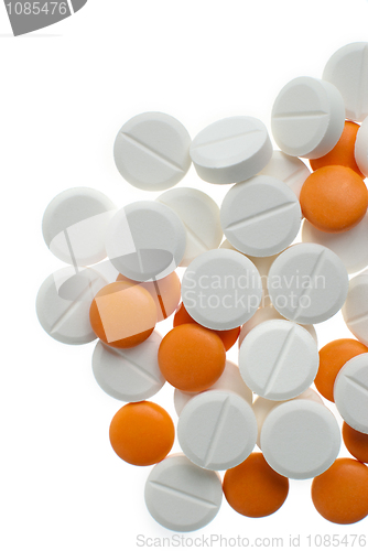 Image of White and orange pills