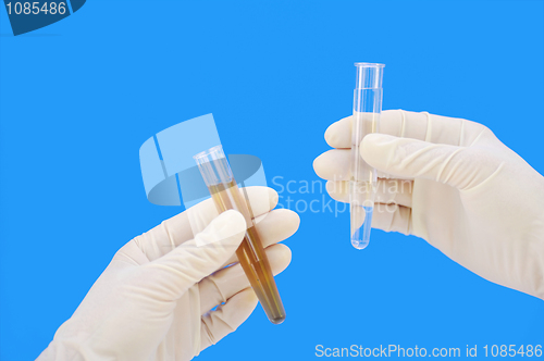 Image of Clean and dirty water samples in hands