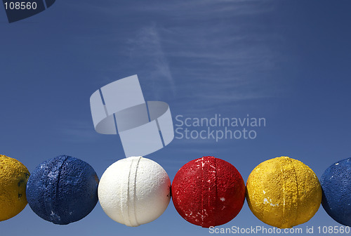 Image of Colourful fishing net floats