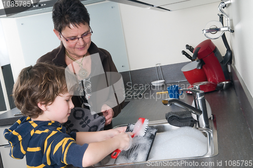 Image of Doing the dishes with grandma