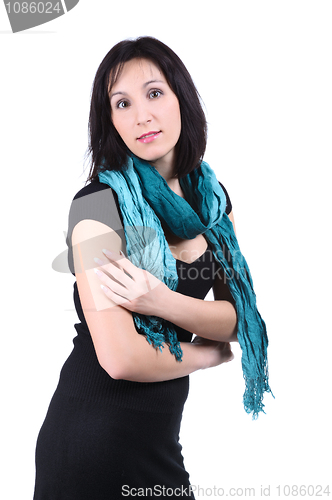 Image of Girl in a black dress with a green scarf, isolated