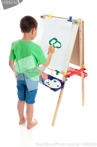 Image of A boy painting a picture