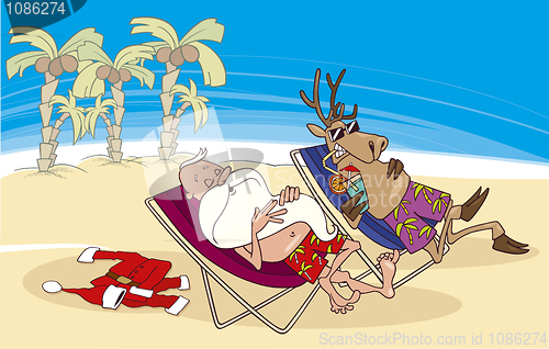 Image of santa and reindeer having a rest on the beach