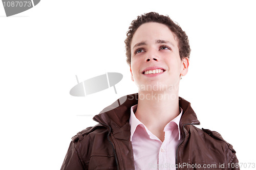 Image of young man smiling and looking to camera