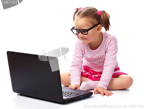 Image of Little girl with laptop