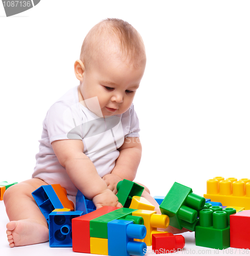 Image of Little boy with building bricks