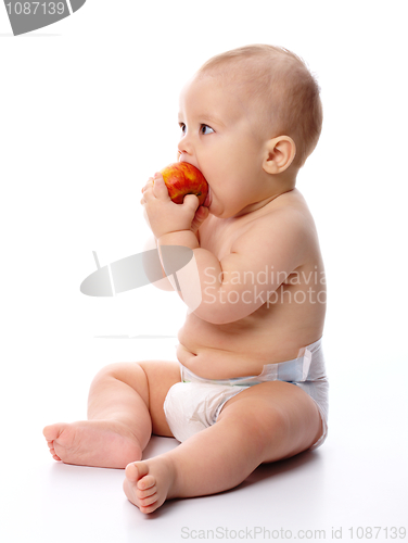 Image of Little child with apple