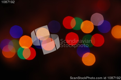 Image of Christmas lights glowing (blur motion background)