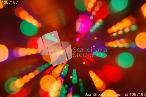 Image of Christmas lights glowing (blur motion background)