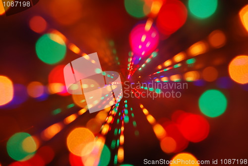 Image of Christmas lights glowing (blur motion background)