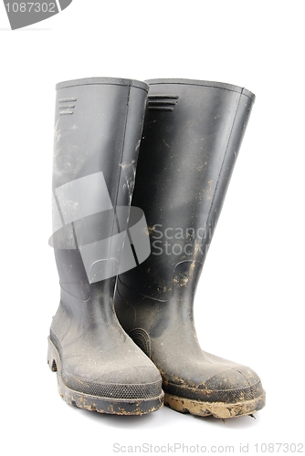 Image of Pair of black rubber boots on white