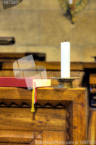 Image of Detail of hymnal and candle