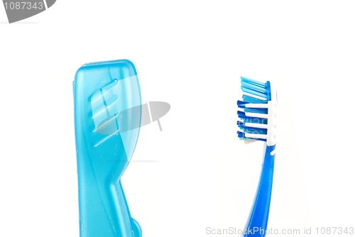 Image of Blue and white tooth brush and case