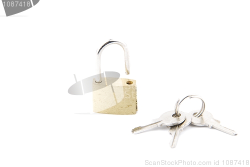 Image of Golden open padlock with keys on white