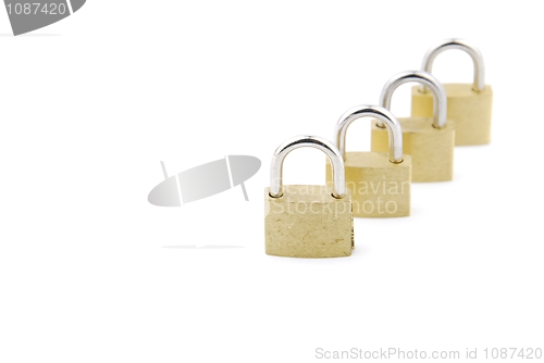 Image of Golden closed padlocks on white