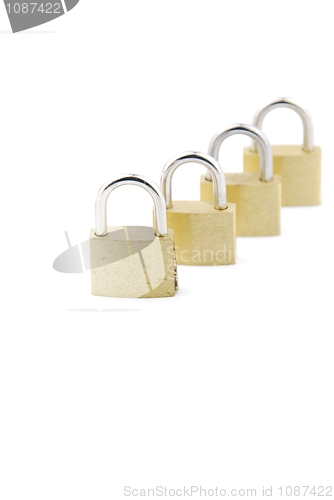 Image of Golden closed padlocks on white