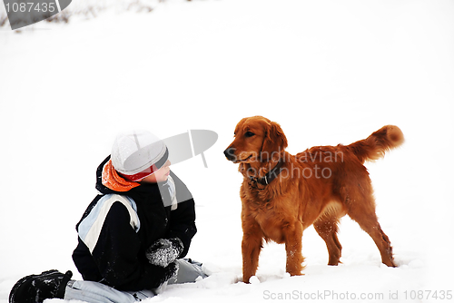 Image of Teenage boy and his dog