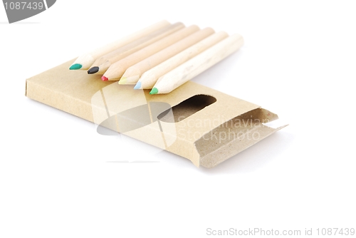 Image of Colour pencils and pencil case on white