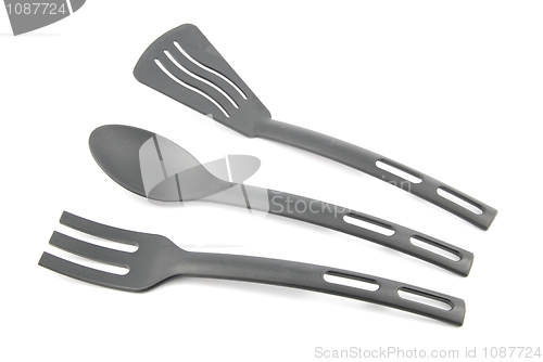 Image of Black plastic kitchen utensil on white