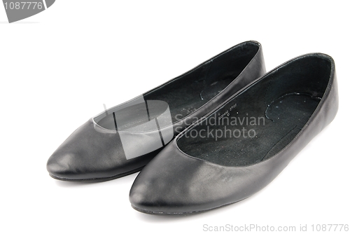 Image of Lady black leather ballet flat shoes on white