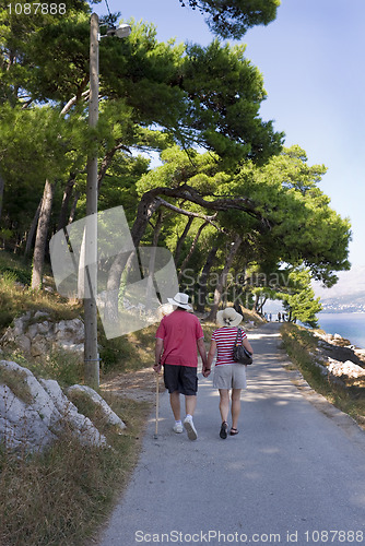 Image of Mature couple walk