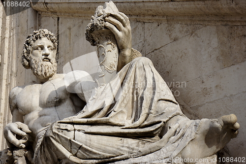 Image of Statue with horn of plenty in Piazza del Campidoglio, in Rome.