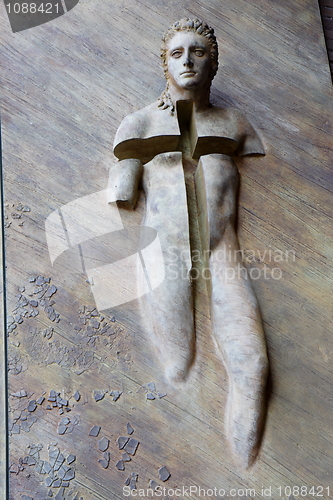 Image of Religious sculpture on a door