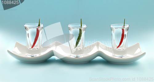 Image of Chillies In Shot Glasses