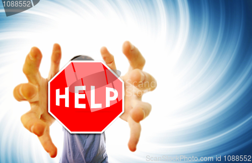 Image of Man grabing a help sign.