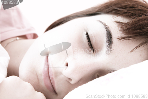 Image of Beautiful young woman sleeping.