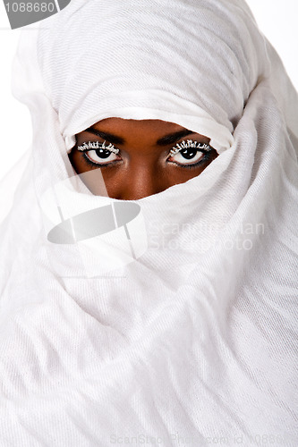 Image of Female face in white scarf