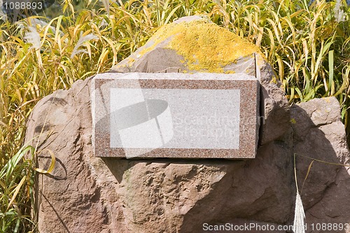 Image of Stone with a Blank Sign